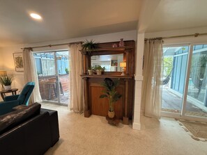 Antique mantle piece lends warmth and architectural interest. 