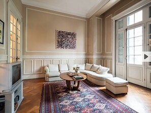 beautiful sunny living room with French doors