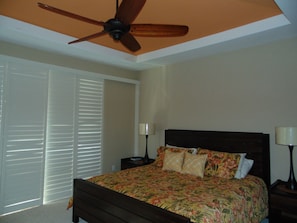 Master suite: king bed, night stands, dresser, TV