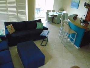 Family room has 2 couches (one with comfy hide-a-bed,) convenient C-tables