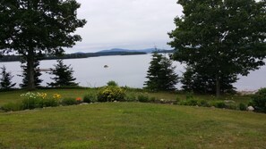 Mt. Desert Island in distance, Flanders Bay and perennial gardens