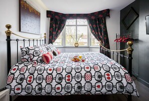 Affectionately known as Noir, this bedroom with king bed awaits you... 