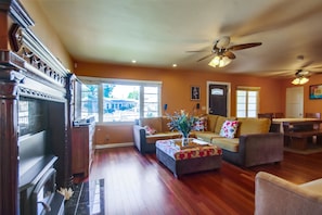 living room with hardwood floors & fireplace