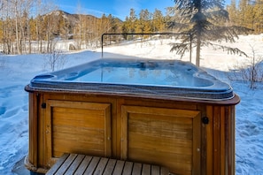 Soak in the private hot tub after a day on the slopes