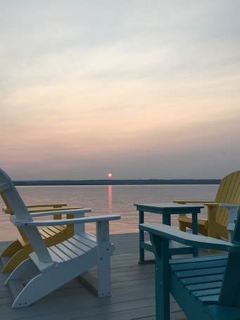 Enjoy sunsets out over the water from the dock.