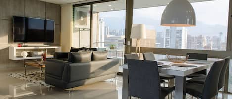 Enjoy in style the gorgeous views of the city and your new 70 inch 4kTV & cable 