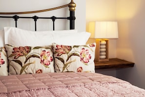 Kingsize bedroom with luxurious fabrics