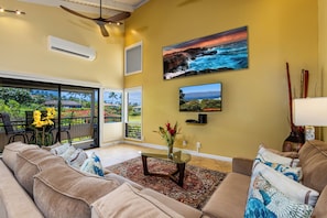 Living Room w/ Vaulted Ceiling.