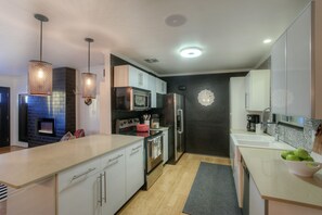Stainless appliances & Quartz counter-tops. Farm sink. Fully equipped kitchen.
