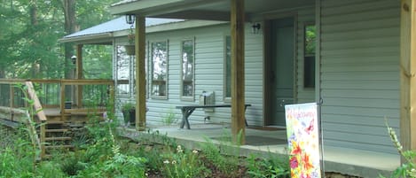 You will loved the deck - both uncoverd and covered - looking into the forest
