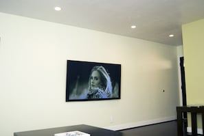 65" 4K SmartTV with open access to cable, premium channels Netflix and Amazon