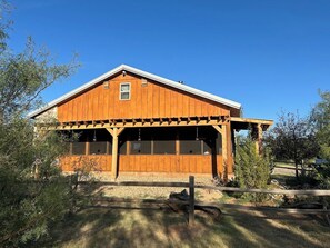 Exterior side of Buffalo Lodge facing east looking out on the pond. 