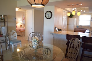 From the dining area looking towards the guest bedroom and kitchen.