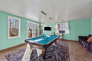 The pool room's French doors lead to your private cove.