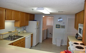Looking back to kitchen from over the high bar.
