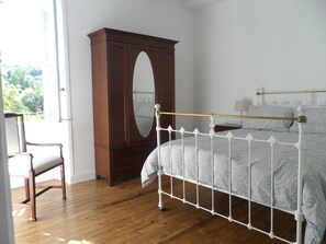 Master bedroom with view over duck pond and the valley