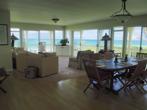 Living room with ocean and beach views and dining room with Kailua Beach

