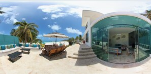 A/C coniditioned TV Room + Outdoor lounge and dinning table, all with ocean view