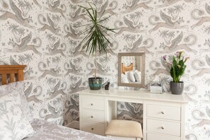 Stylish and tastefully decorated, very large, bedroom including a dressing table