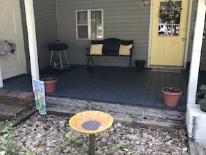 Grill out on the front porch and listen to the birds sing