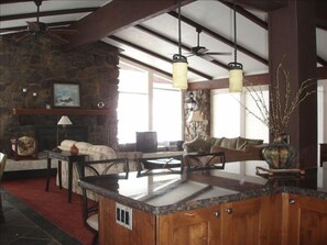 Enjoy the fireplace and heated floors as you watch wildlife stroll by outside.