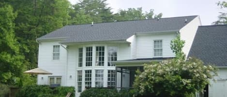 Back house, view of porch and deck. 