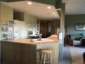 Kitchen, looking towards bedrooms and sitting nook.