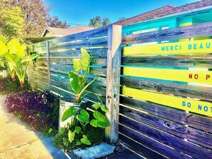 Gated compound adds privacy for guests &  their up-to two, off-street vehicles.