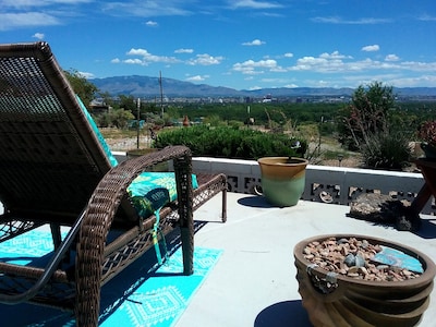 Secure carport, amazing Views and Reviews!  Private suite with patio. 