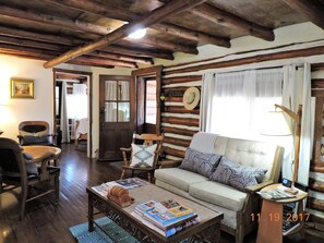 Log Cabin Living Room with Log Beams, Loveseat, Western Art, Books & Magazines! 