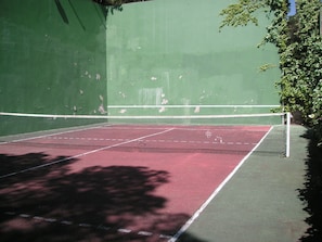 Tennis court is a bit shorter than a regular size but suitable for squash etc.