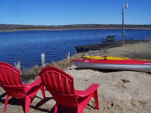 Sandy beach area to watch the boats go by, toes in sand, drink in hand!!!