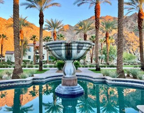 Welcome to Legacy Villas! An upscale, gated Resort Community directly adjacent to the famous La Quinta Resort with 12 pools and spas, clubhouse, gym, fragrant citrus trees, fountains and gorgeous Mountain Views, surrounded by Golf, Tennis & Shopping