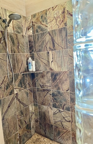 first bathroom - shower, sink and toilet