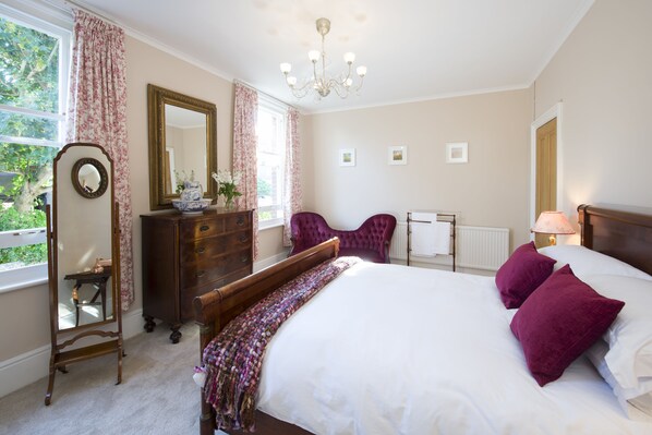Master Bedroom (king-size) with seating & dressing area.