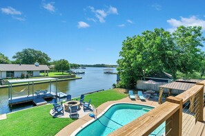 Step up to our upper deck for a poolside, lakeside, and channel-side view!