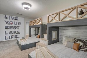 Dive into comfort in our BUNK ROOM! With two queens and two twins and sleeps 6!