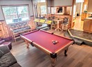 Billiard Room Flows into Open Floor Plan Overlooks Forest, Mountains, & Valleys