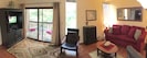 Pano view of the first floor living room. Queen sofa bed. First Floor 2nd Bath.