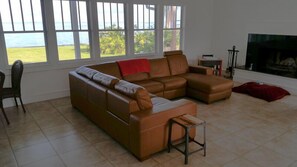 a handsome leather sofa, but who stays inside in Florida?