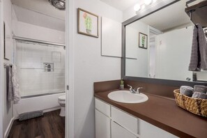 Jack&Jill style bathroom w/ access from each bedroom. Private vanity in master.