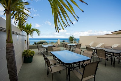 Stroll to Beach from Ocean View Condo with Pool & Rooftop Deck