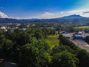 view from behind cabin by drone