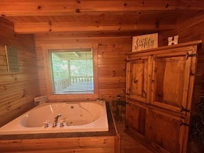 Jacuzzi tub in bedroom