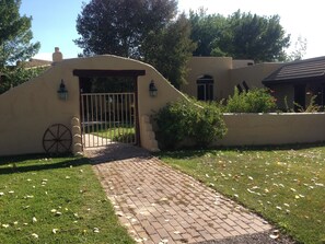 Gate entrance to the property. The Casita is through the gate on the right.