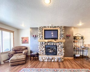 TV and Fire Place in Family Room