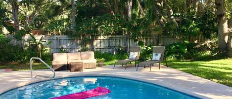 Relaxing poolside in the early morning sun.