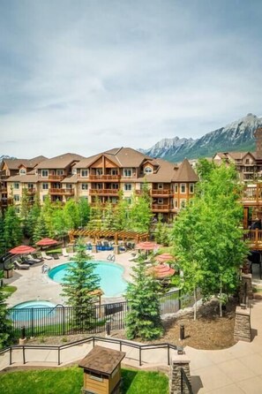 Enjoy the outdoor pool and hot tub in one of Canmore's premium resorts.