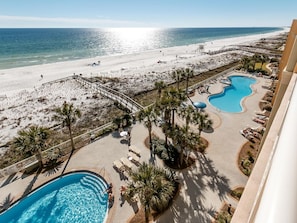 View of Two Beautiful Pools & Beach Looking West Toward Sunset From Balcony!