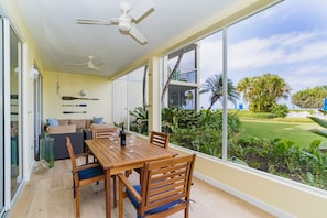 Large screened lanai with dining for 6 and comfortable lounge area.